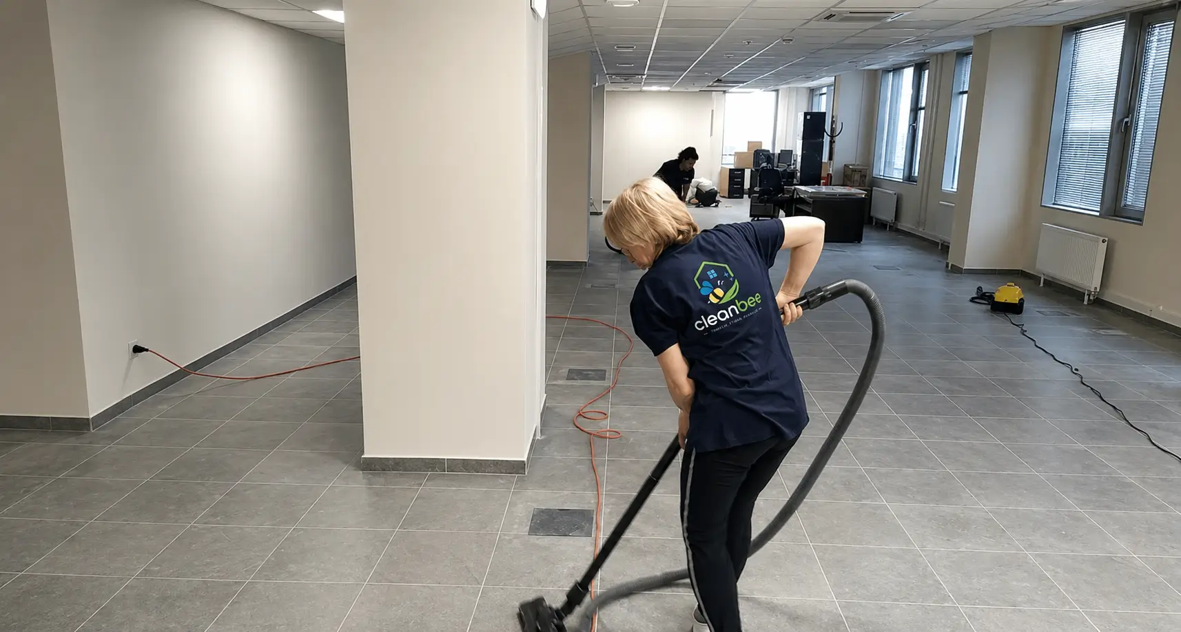 CleanBee cleaning team preparing an apartment cleaning in Baku